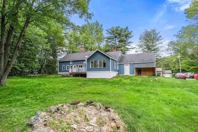 71 Plummer Hill Rd, Belmont, NH 03220 - view of front facade featuring a chimney, a front lawn, and a wooden deck