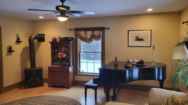 987 Dunbar Hill Rd, Grantham, NH 03753 - sitting room featuring a wood stove, wood finished floors, a ceiling fan, and recessed lighting