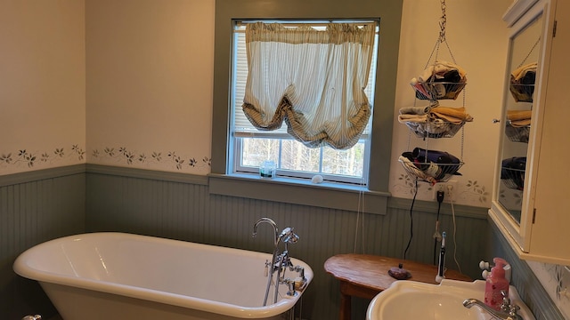 987 Dunbar Hill Rd, Grantham, NH 03753 - full bathroom with a wainscoted wall and a freestanding tub
