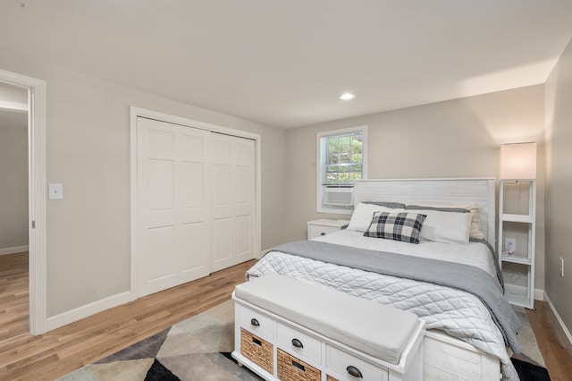 14 Anagance Ln, Wolfeboro, NH 03894 - bedroom featuring light wood-style floors, a closet, recessed lighting, and cooling unit