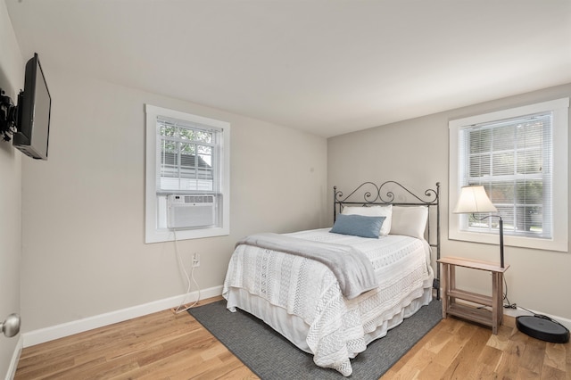 14 Anagance Ln, Wolfeboro, NH 03894 - bedroom featuring cooling unit and light wood finished floors