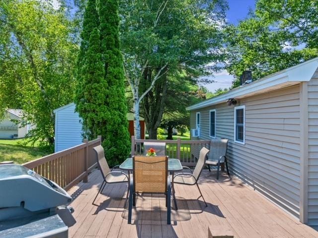 14 Anagance Ln, Wolfeboro, NH 03894 - wooden terrace with outdoor dining area and grilling area