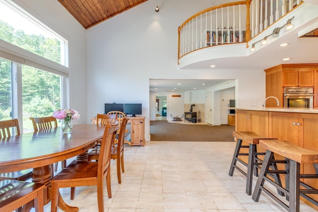 123 Stephen Dr, Goffstown, NH 03045 - dining area featuring high vaulted ceiling, light carpet, wooden ceiling, and recessed lighting