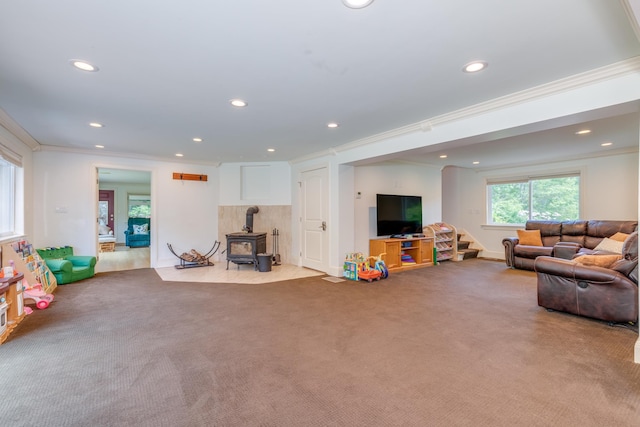 123 Stephen Dr, Goffstown, NH 03045 - living room featuring ornamental molding, recessed lighting, carpet flooring, a wood stove, and stairway