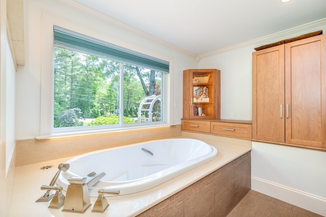 123 Stephen Dr, Goffstown, NH 03045 - bathroom featuring a garden tub, crown molding, and tile patterned floors