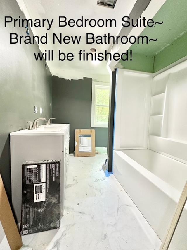 22 Mason Rd, Merrimack, NH 03054 - bathroom with a tub and vanity