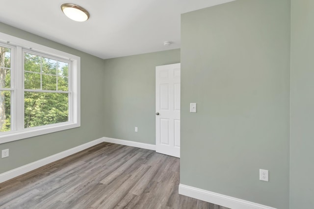 53 Richards Way, Farmington, NH 03835 - unfurnished room with wood finished floors and a smoke detector