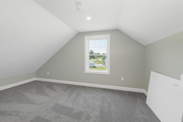 53 Richards Way, Farmington, NH 03835 - additional living space featuring vaulted ceiling and dark carpet