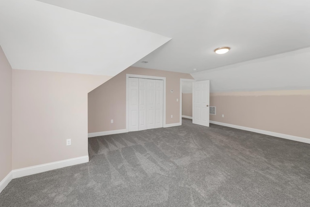 53 Richards Way, Farmington, NH 03835 - additional living space with vaulted ceiling and carpet flooring