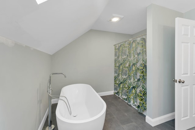 53 Richards Way, Farmington, NH 03835 - bathroom featuring lofted ceiling and a soaking tub