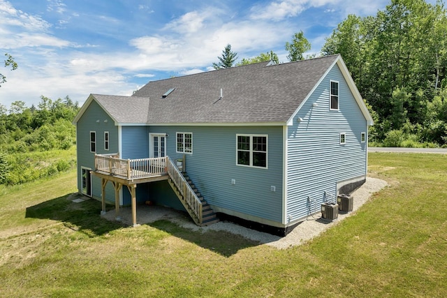 53 Richards Way, Farmington, NH 03835 - back of house with a deck, stairs, a lawn, and roof with shingles
