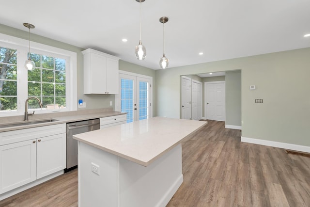 53 Richards Way, Farmington, NH 03835 - kitchen featuring dishwasher, french doors, light countertops, recessed lighting, and a center island