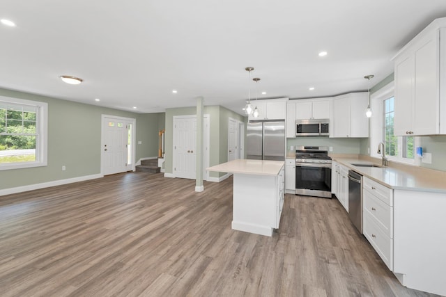 53 Richards Way, Farmington, NH 03835 - kitchen featuring stainless steel appliances, plenty of natural light, light wood finished floors, and recessed lighting