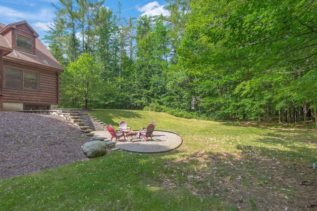 104 Rolling Ridge Rd, Bartlett, NH 03812 - view of grassy yard featuring stairs and an outdoor fire pit