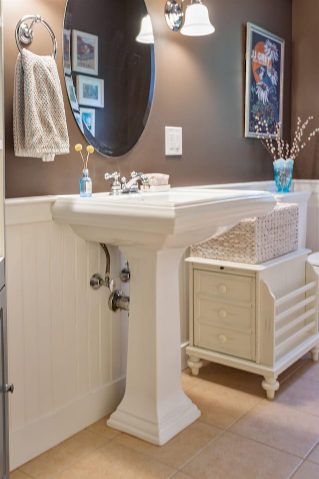 9 Deerhaven Dr, Exeter, NH 03833 - bathroom with tile patterned floors and wainscoting