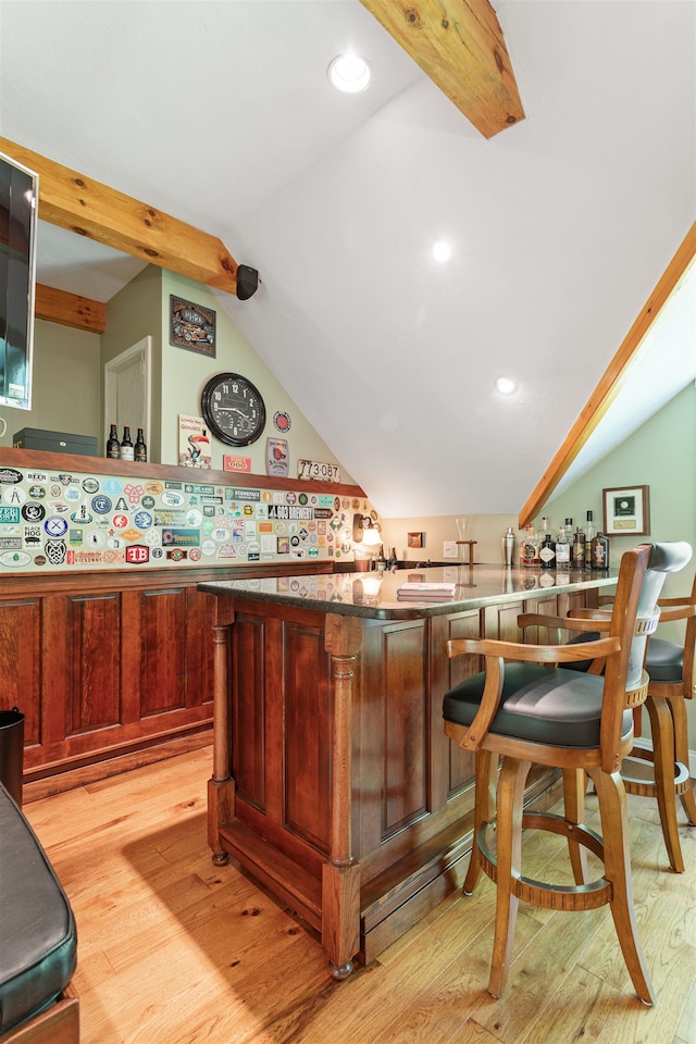 9 Deerhaven Dr, Exeter, NH 03833 - indoor dry bar featuring lofted ceiling, light wood finished floors, and recessed lighting