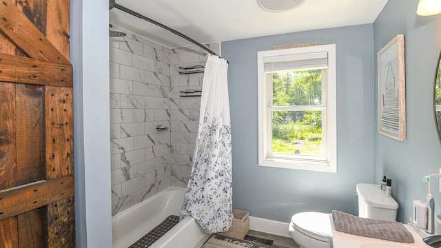 2129 E Conway Rd, Conway, NH 03813 - full bath featuring baseboards and shower / bath combo with shower curtain
