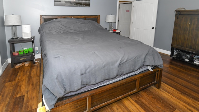 2129 E Conway Rd, Conway, NH 03813 - bedroom with wood finished floors and baseboards