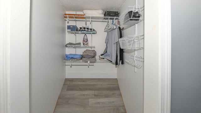 2129 E Conway Rd, Conway, NH 03813 - spacious closet featuring wood finished floors