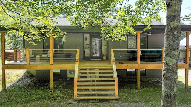 2129 E Conway Rd, Conway, NH 03813 - rear view of property with a shingled roof, a wooden deck, and stairway