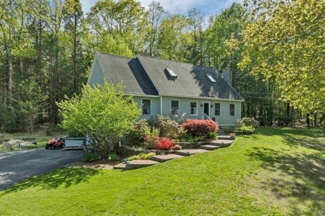 93 Birch Rd, Chester, NH 03036 - view of front facade with a front yard and asphalt driveway