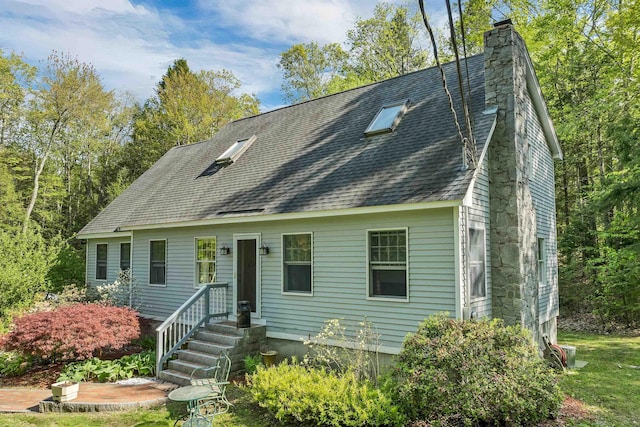 93 Birch Rd, Chester, NH 03036 - cape cod home featuring a shingled roof and a chimney