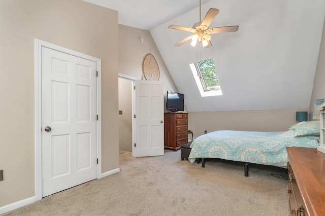 93 Birch Rd, Chester, NH 03036 - carpeted bedroom with lofted ceiling, a skylight, and ceiling fan