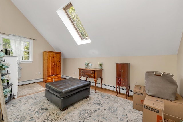 93 Birch Rd, Chester, NH 03036 - living area with baseboard heating, a skylight, lofted ceiling, and wood finished floors