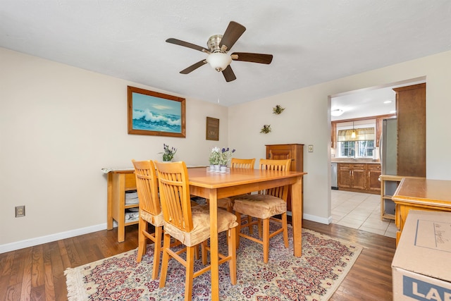93 Birch Rd, Chester, NH 03036 - dining room with ceiling fan and light wood-style flooring