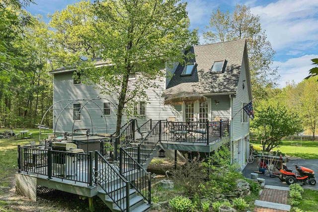 93 Birch Rd, Chester, NH 03036 - back of house with a wooden deck, a covered hot tub, roof with shingles, and stairway