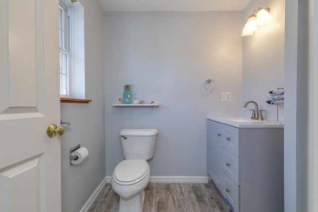 4 Lancer Ln, Danville, NH 03819 - half bath featuring vanity and wood finished floors