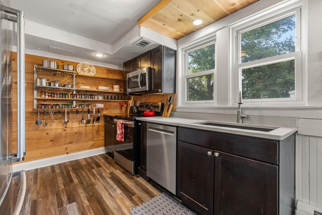 71 Hill St, Dover, NH 03820 - kitchen with stainless steel appliances, dark wood-style floors, light countertops, recessed lighting, and a raised ceiling