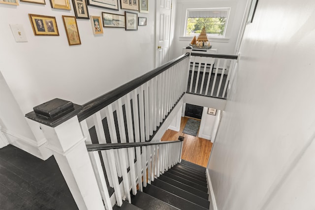 71 Hill St, Dover, NH 03820 - staircase featuring wood finished floors