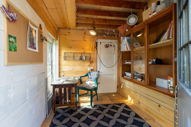 71 Hill St, Dover, NH 03820 - sitting room featuring wooden walls, tile patterned floors, and beamed ceiling
