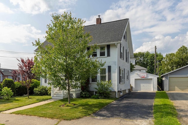 71 Hill St, Dover, NH 03820 - view of front of house featuring a chimney, a garage, an outbuilding, roof with shingles, and a front yard