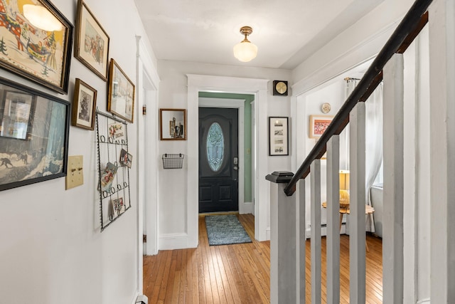 71 Hill St, Dover, NH 03820 - foyer featuring light wood-type flooring and stairs