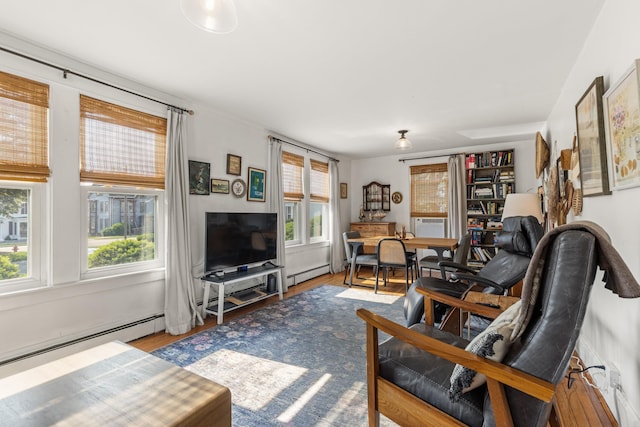 71 Hill St, Dover, NH 03820 - living room featuring baseboard heating, wood finished floors, and cooling unit