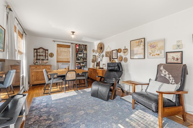 71 Hill St, Dover, NH 03820 - living area featuring wood finished floors, a desk, and cooling unit