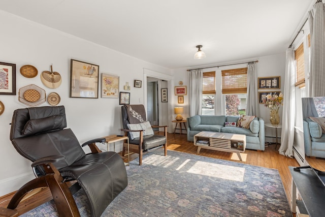 71 Hill St, Dover, NH 03820 - living area with wood finished floors and baseboard heating