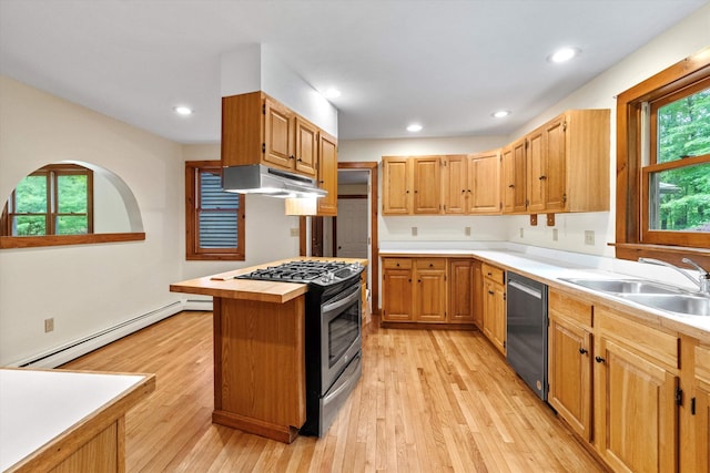 147 Durham Point Rd, Durham, NH 03824 - kitchen featuring stainless steel appliances, baseboard heating, under cabinet range hood, light wood finished floors, and recessed lighting
