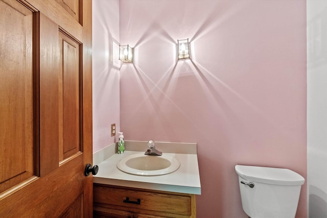 147 Durham Point Rd, Durham, NH 03824 - half bathroom with vanity and toilet