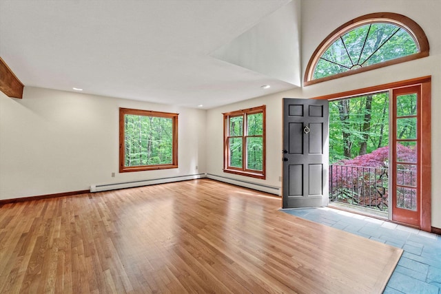 147 Durham Point Rd, Durham, NH 03824 - entrance foyer featuring a baseboard heating unit, wood finished floors, and recessed lighting
