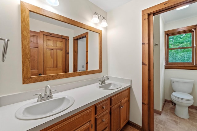 147 Durham Point Rd, Durham, NH 03824 - bathroom with double vanity and toilet