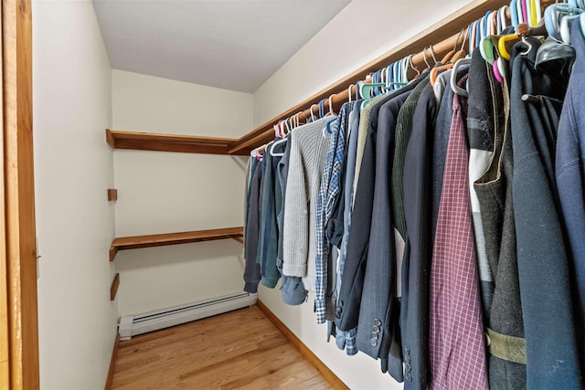 147 Durham Point Rd, Durham, NH 03824 - walk in closet with baseboard heating and wood finished floors