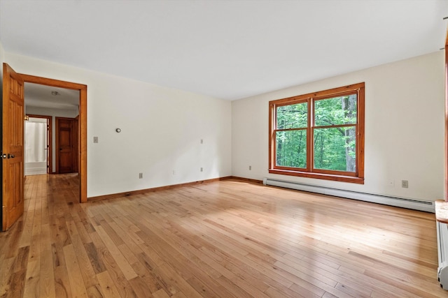 147 Durham Point Rd, Durham, NH 03824 - spare room featuring baseboard heating and light wood-type flooring
