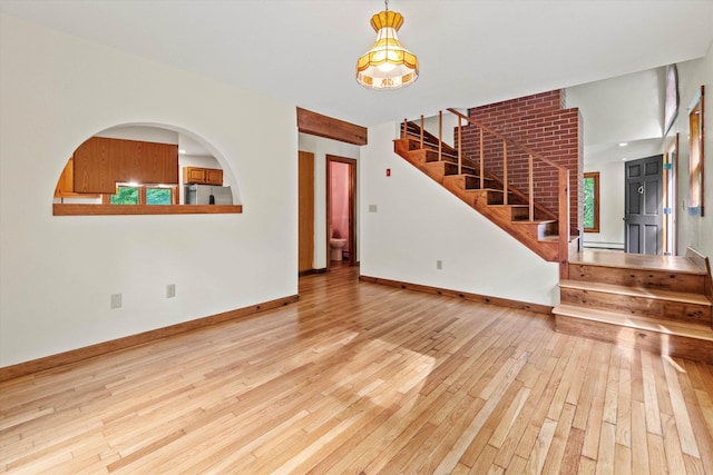 147 Durham Point Rd, Durham, NH 03824 - unfurnished living room with hardwood / wood-style flooring and stairs