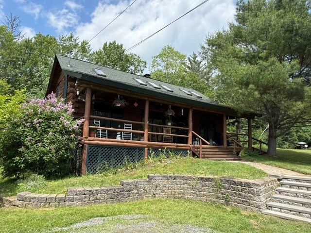 25 Rogers Way, Canaan, NH 03741 - rear view of property featuring covered porch and log siding