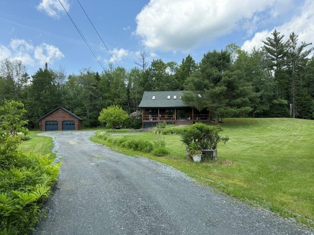 25 Rogers Way, Canaan, NH 03741 - view of front of home with a detached garage, an outdoor structure, a front yard, and a porch