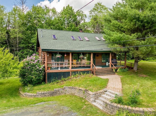 25 Rogers Way, Canaan, NH 03741 - view of front of property featuring log siding, covered porch, roof with shingles, and a front yard