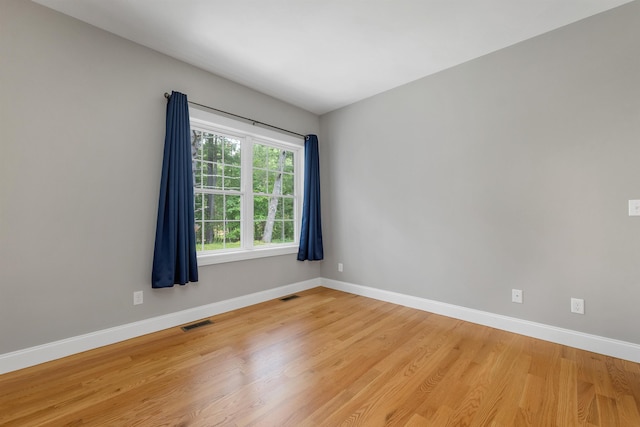 8C Villa Ln, Goffstown, NH 03045 - spare room with baseboards and light wood finished floors
